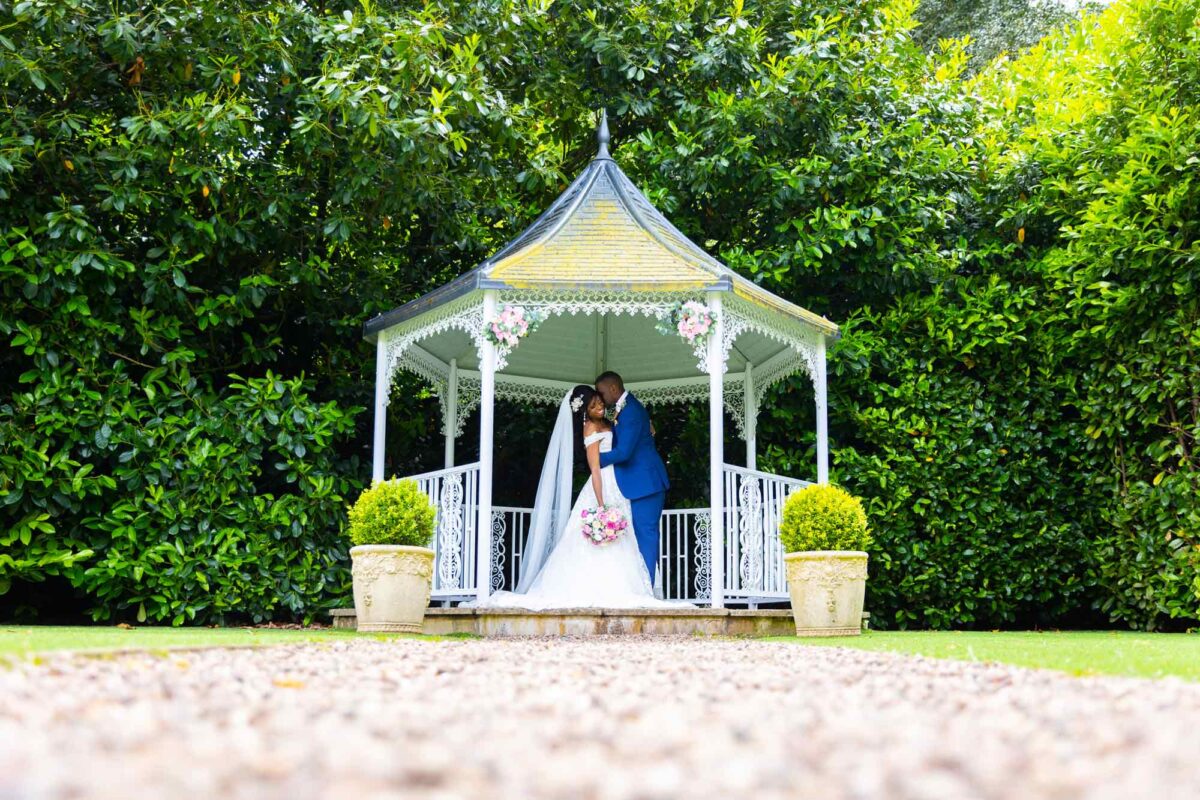 Shanaine and Mathew in the Bandstand at their DIY Wedding at Pendrell Hall.